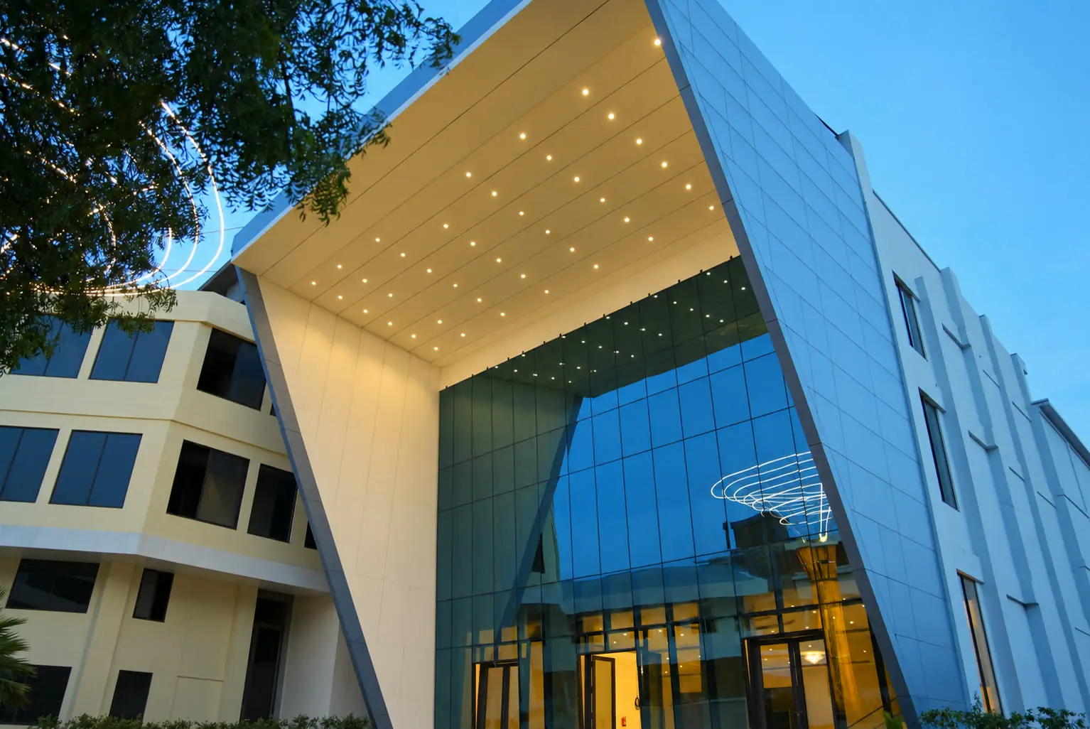 The glass entrance and canopy of the convention centre